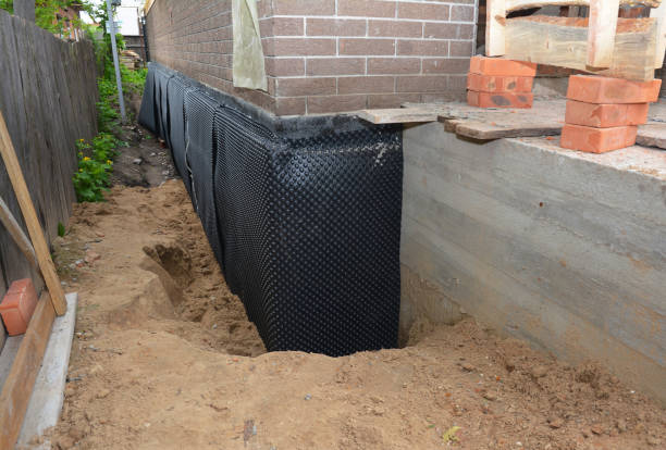 Happy homeowners after waterproofing job in Chester Gap